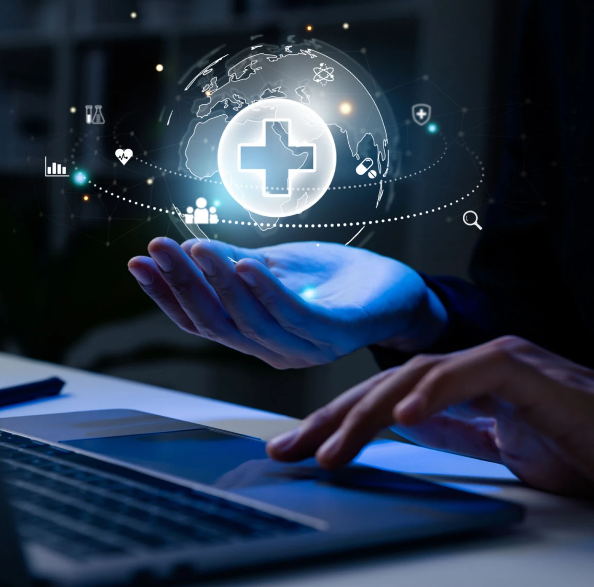 Futuristic healthcare symbols and laptop